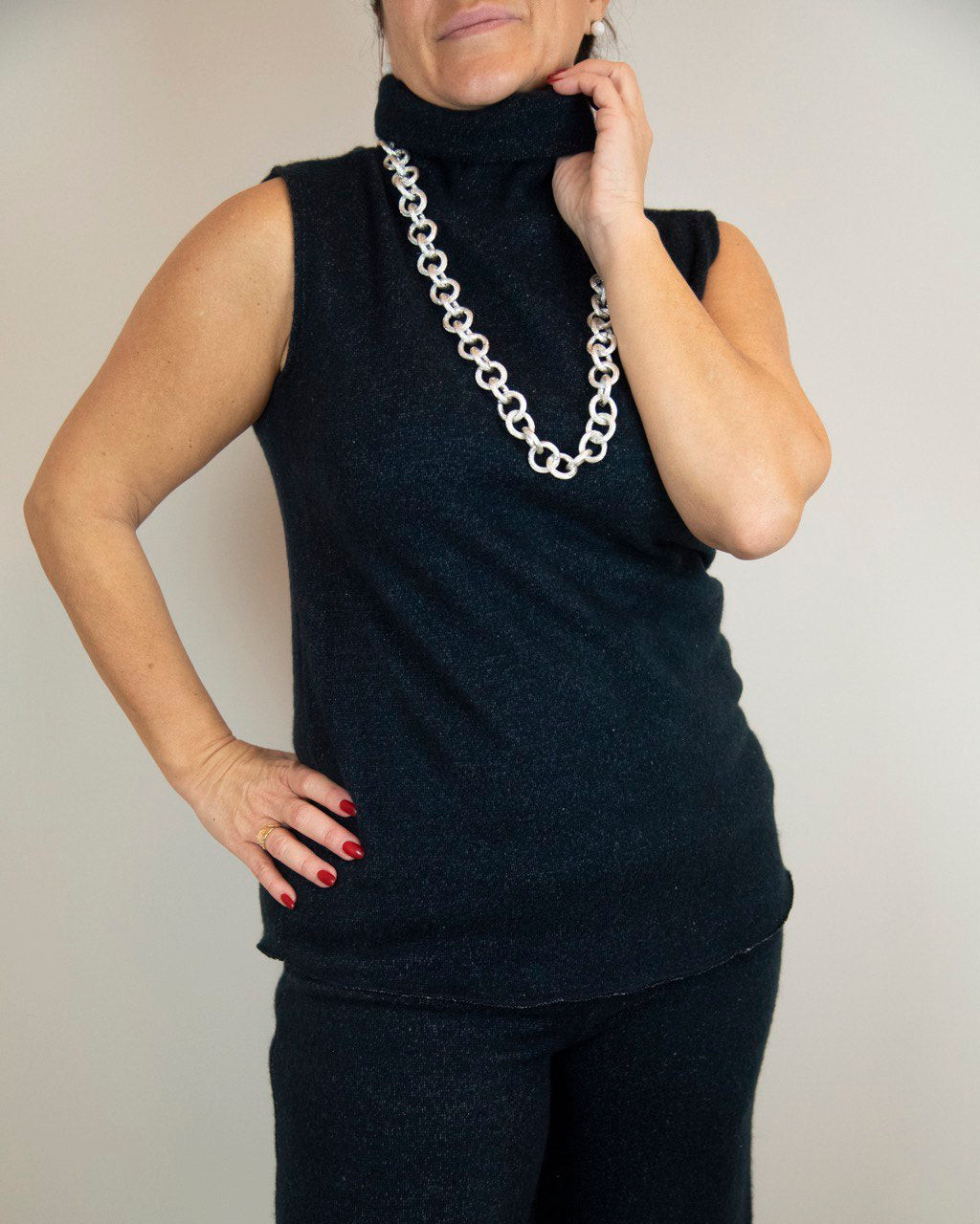 Sleeveless turtleneck sweater