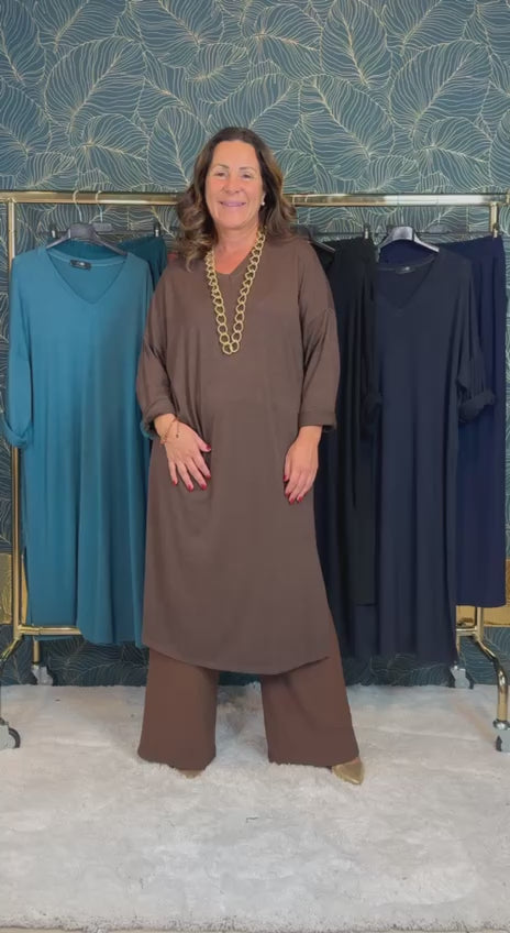 Complete with caftan dress and Aida trousers